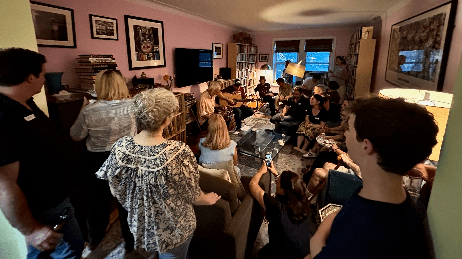 Photo: MVP donor organizing volunteers and staff at a summer house party for MVP in New York.