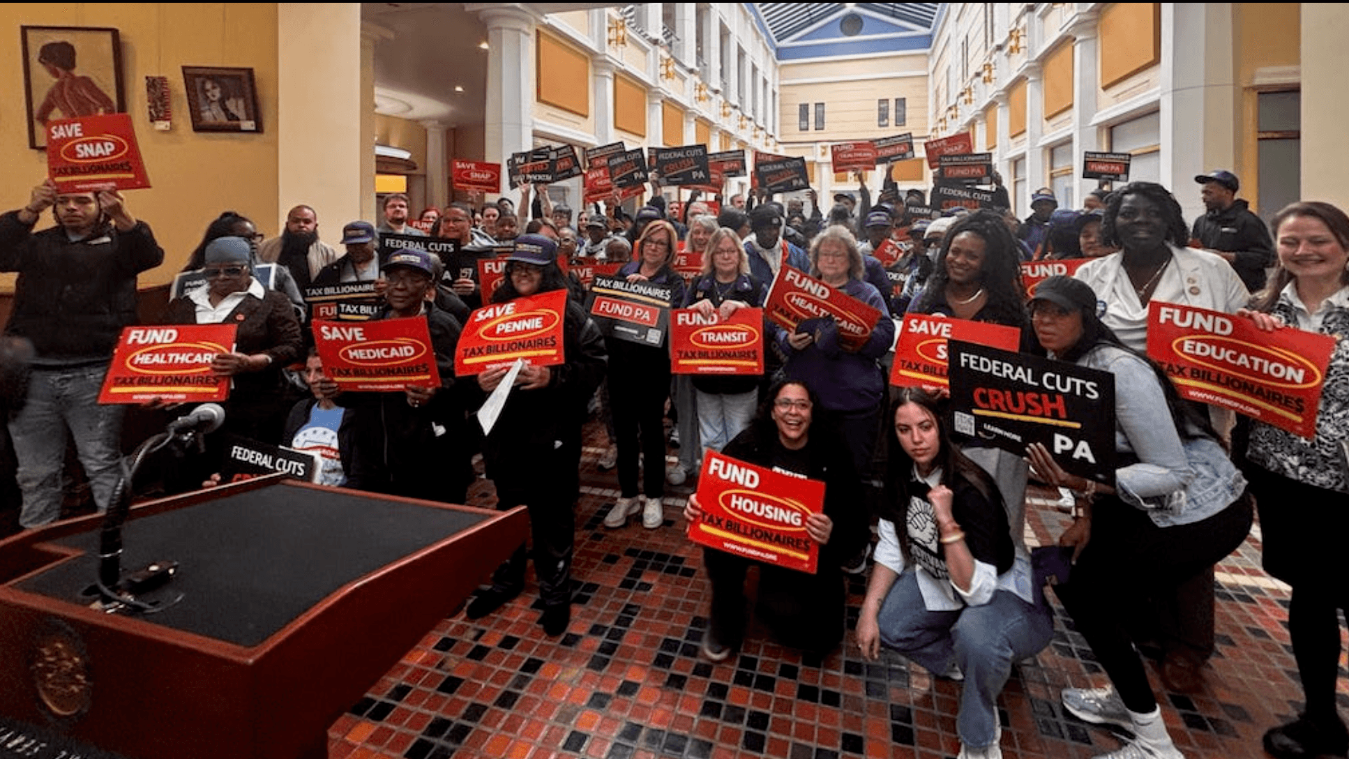 Photo: Pennsylvania Stands Up members advocating for increased taxes on billionaires to help fund programs working-class people need.