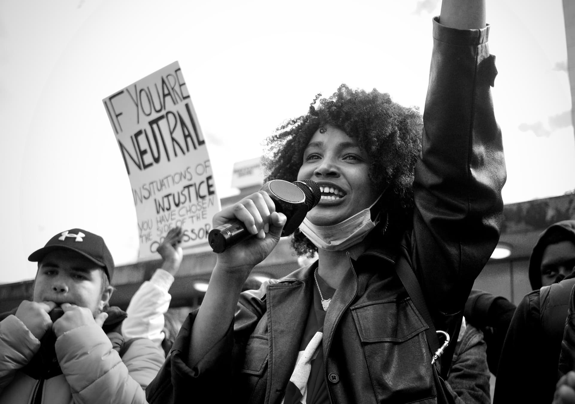 Black and white photo of a rally