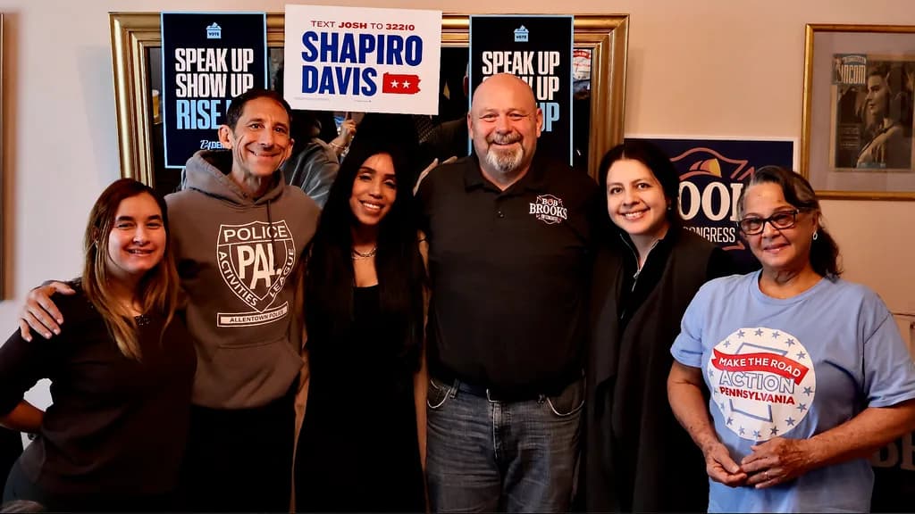 Make the Road Action PA organizers and voters posing indoors with House candidate Bob Brooks.