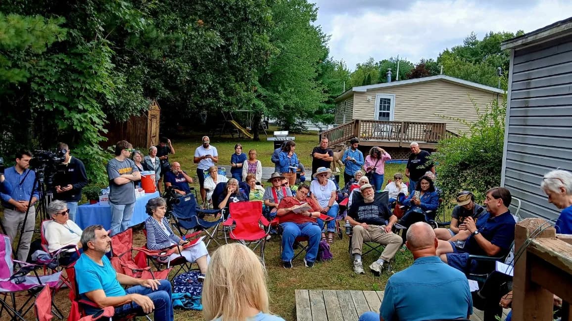 Photo: Maine Labor Climate Council and Maine Democratic Senate candidate Troy Jackson, talking with mobile home residents about the issues facing working-class voters.