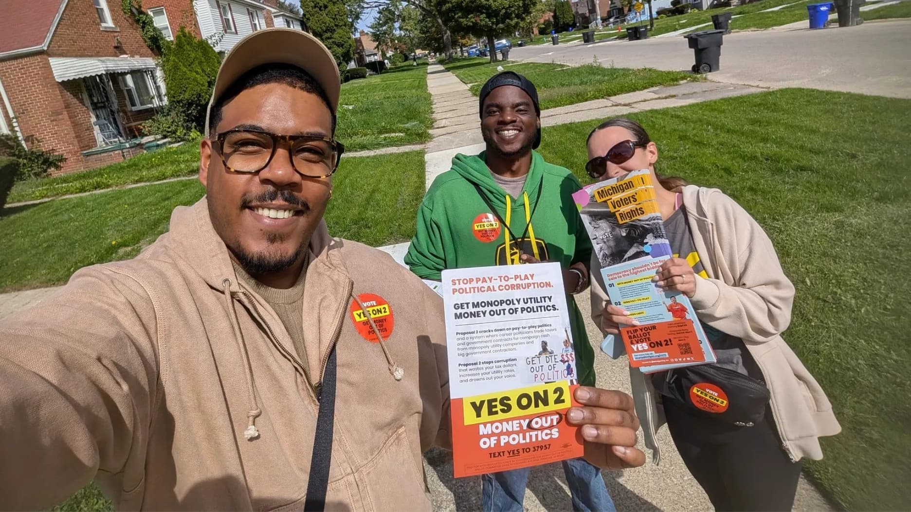 Photo: Canvassers with Michiganders for Money Out of Politics (MMOP) knocking doors in Detroit to mobilize voters in support of Prop 2, a ballot measure to restrict corporate money in state politics.